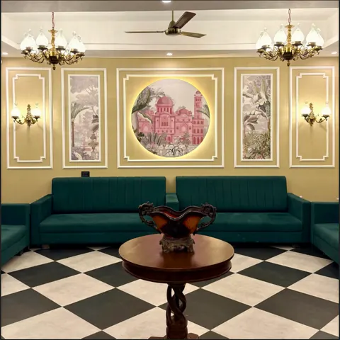 Teal seating arranged around a carved wooden table