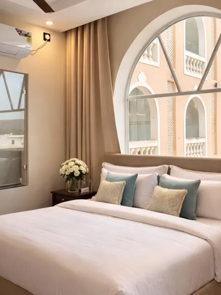 Imperial Family Suite beneath its tall arched window