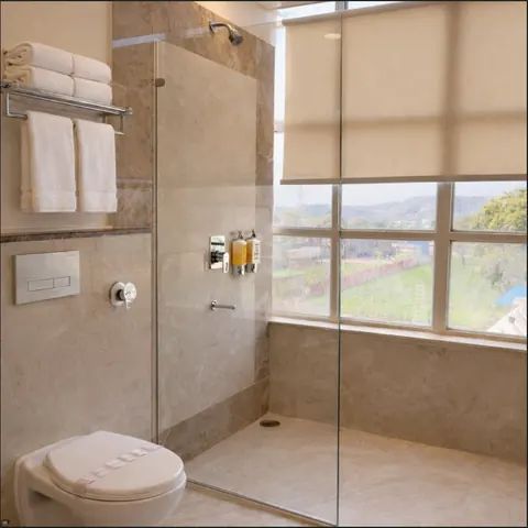 Signature Suite bathroom with a glass walk-in shower
